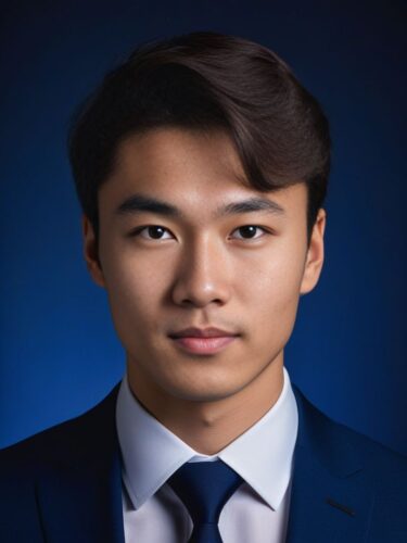 Studio Headshot of a Young Eurasian Man in a Tailored Dark Blue Suit