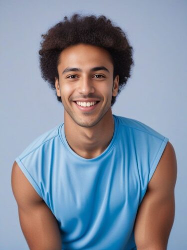 Happy Young Man in Sky Blue Yoga Outfit