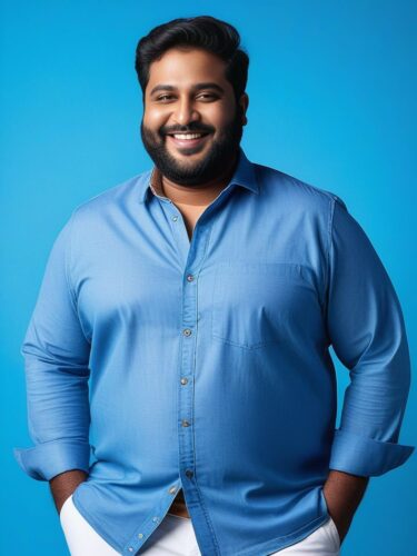 Smiling Plus-Size South Asian Man in Casual Chic Outfit