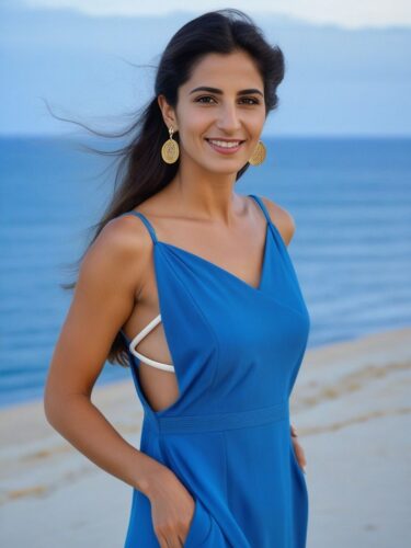 Kurdish Woman in Blue Dress on the Beach