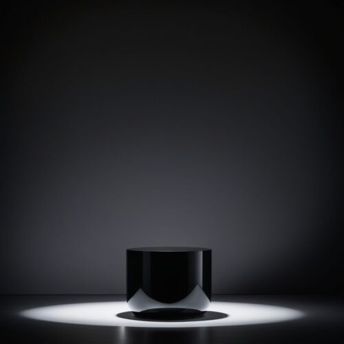 Sleek Black Pedestal in Studio with Dramatic Shadows