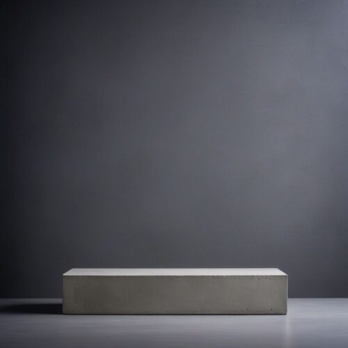 Minimalist Concrete Plinth Against Textured Grey Wall