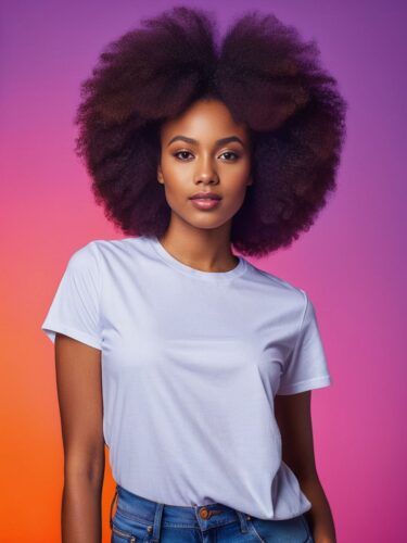 Confident Young Woman with Afro in White T-Shirt on Colorful Background